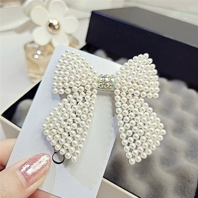 Rhinestone Pearl Bow Hair Clip - огляд і ціна Body Jewelry Wholesale